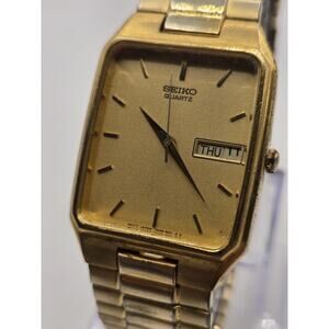 Seiko Tank Watch Men 28mm Gold Dial Gold Tone Rectangle 7N33-5028 New Battery